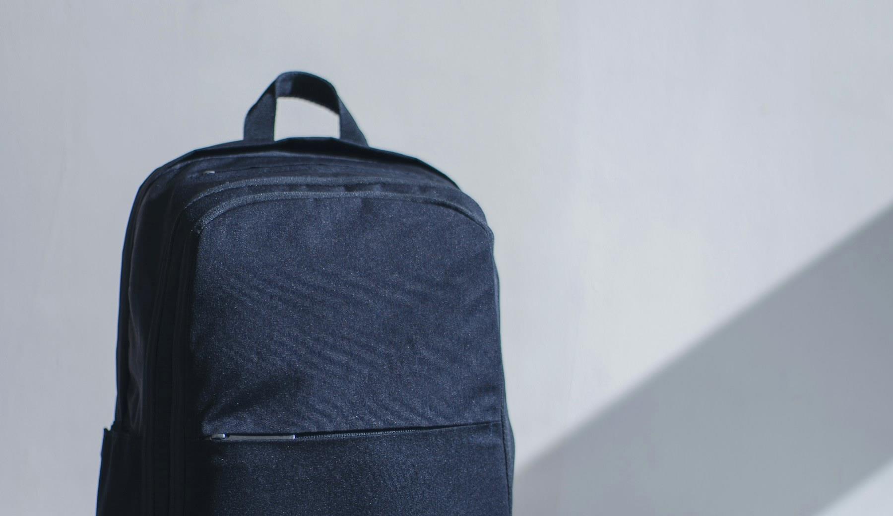Respectful editorial scene for Nomatic Travel Bag: Features, Trade-offs and Alternatives